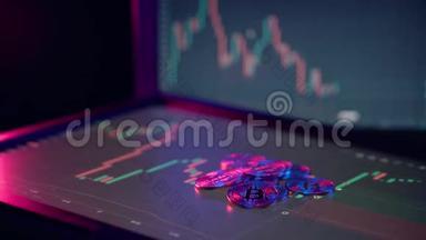 加密货币黄金比特币BTC比特币图表在电脑屏幕上的红蓝光比特币挖掘概念